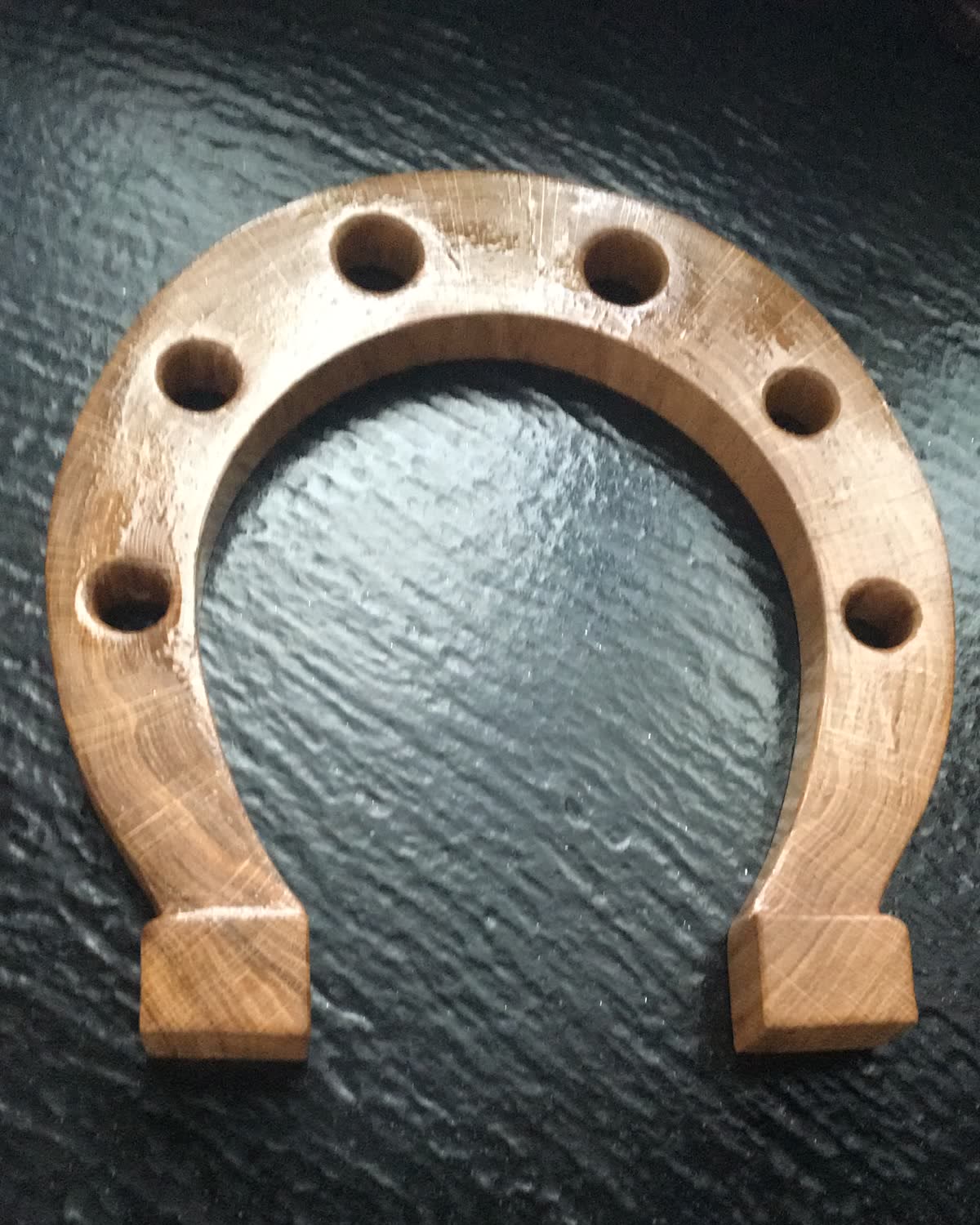 Carved oak horseshoe sample